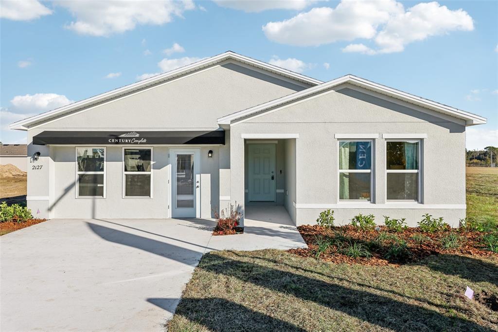 This is a floor plan for a single-story house with a garage and three bedrooms — 6576 GURLEY STREET, INVERNESS, FL