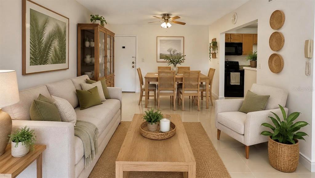 A living and dining area features light-colored furniture, a wooden coffee table, and tile flooring — 6831 W 14 COURT UNIT 306, HIALEAH, FL