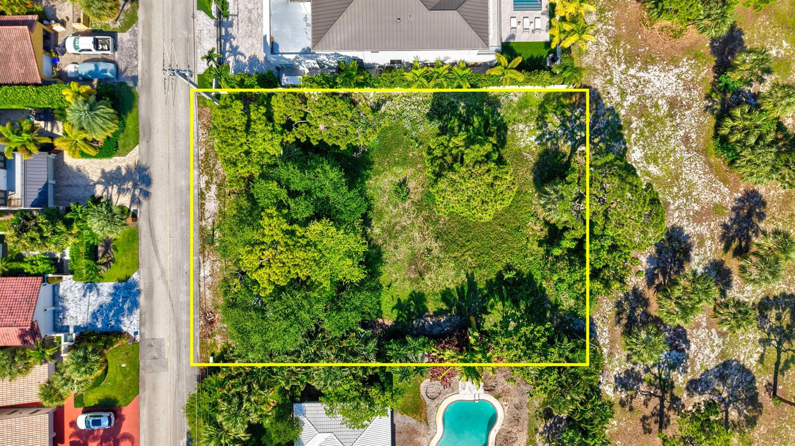 An aerial view shows a rectangular, tree-covered vacant lot outlined in yellow — 442 E Royal Palm Road, Boca Raton FL 33432, BOCA RATON, FL