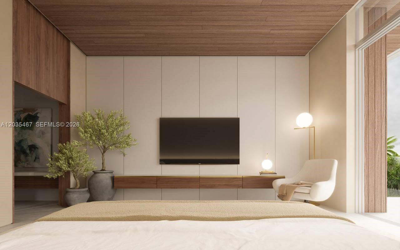 This is a rendering of a modern bedroom featuring a wall-mounted television and wood paneling — 2300 Cap cana, FL