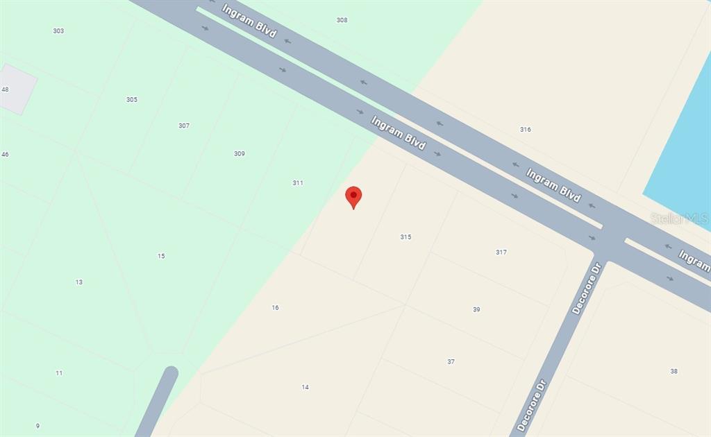 This is a map showing a red location pin on a plot of land — 313 INGRAM BOULEVARD, ROTONDA WEST, FL