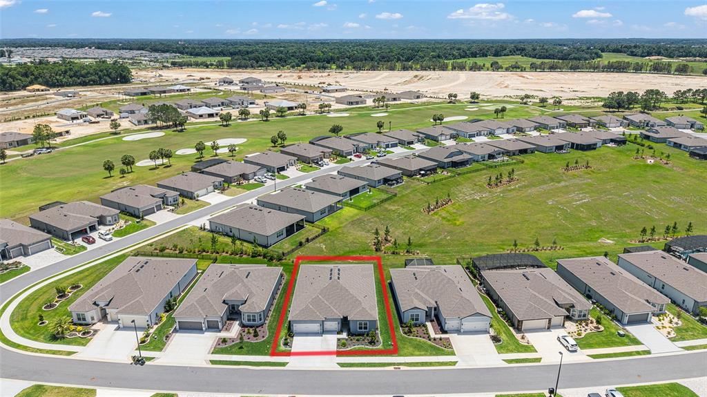 An aerial view shows a suburban neighborhood with a highlighted single-family home — 6046 SW 86 CIRCLE, OCALA, FL