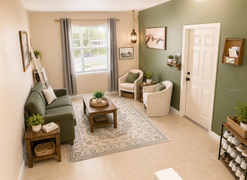 A living room features a green sofa, two armchairs, a coffee table, and tile flooring — 2928 HIDDEN HILLS ROAD UNIT 1405, WEST PALM BEACH, FL