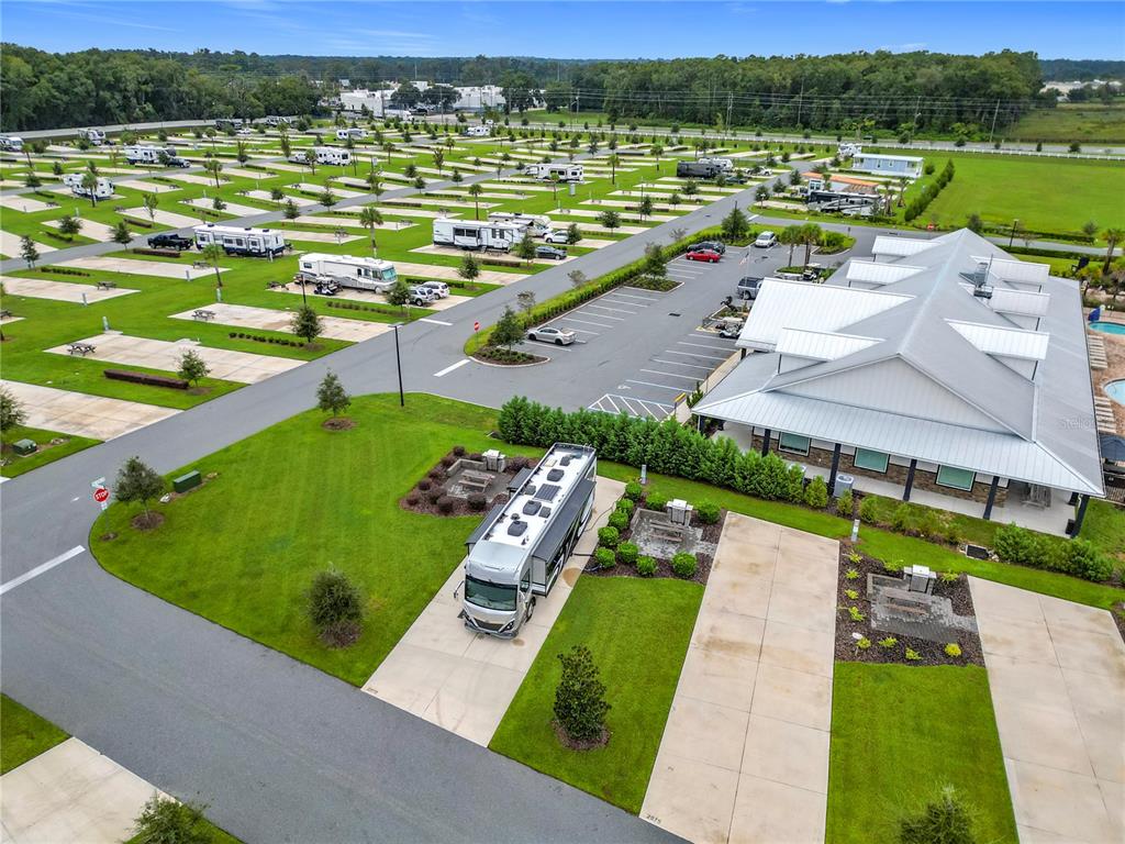 An aerial view shows a large RV park with numerous parked vehicles and a clubhouse — 2979 NW 41ST CIRCLE, OCALA, FL