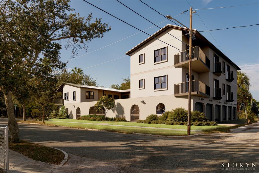 A digital rendering of a three-story apartment building with arched ground-level openings and balconies — 421 15TH AVENUE S, ST PETERSBURG, FL