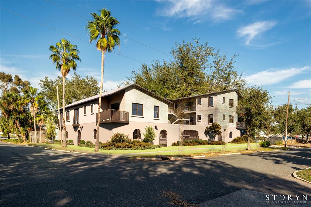 This is an architectural rendering of a two-story apartment building with palm trees — 421 15TH AVENUE S, ST PETERSBURG, FL
