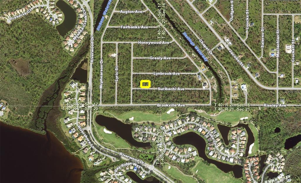 This is an aerial map showing a highlighted vacant lot in a residential neighborhood — 13494&13502 SURIBACHI AVENUE, PORT CHARLOTTE, FL