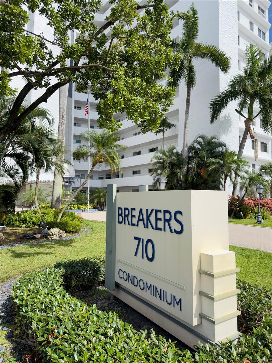 A sign for the Breakers 710 Condominium stands in front of a tall white building — 710 N Ocean Blvd # 603, Pompano Beach FL 33062, POMPANO BEACH, FL