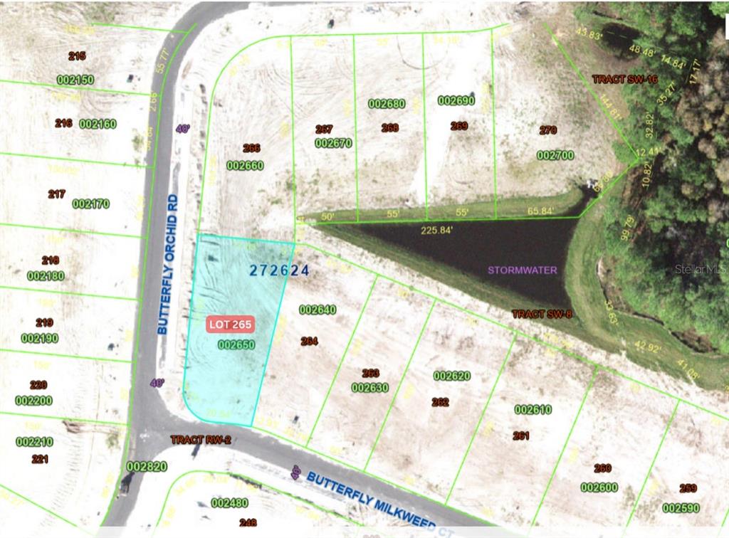 This is a land survey map showing residential lots and a stormwater retention pond — 1257 BUTTERFLY ORCHID ROAD, DAVENPORT, FL