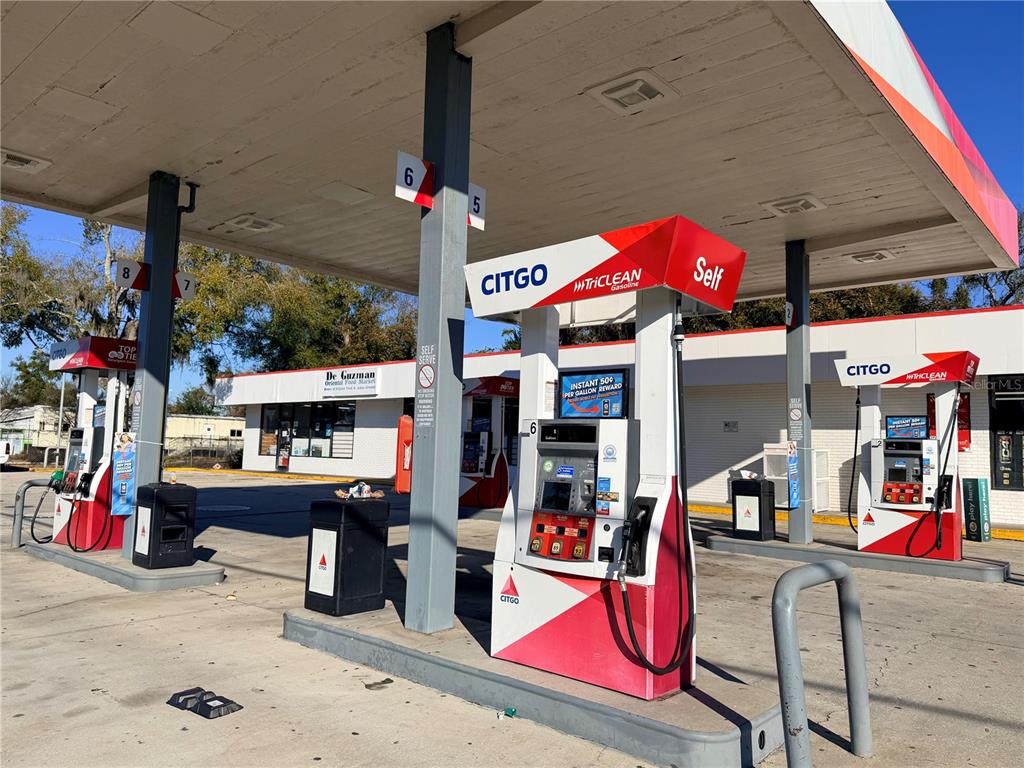 A Citgo gas station with multiple fuel pumps under a large white canopy — 8431 E COLONIAL DRIVE, ORLANDO, FL