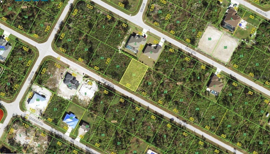 This is an aerial map showing a vacant lot highlighted in yellow among residential properties — 14114 CLARISSA LANE, PORT CHARLOTTE, FL