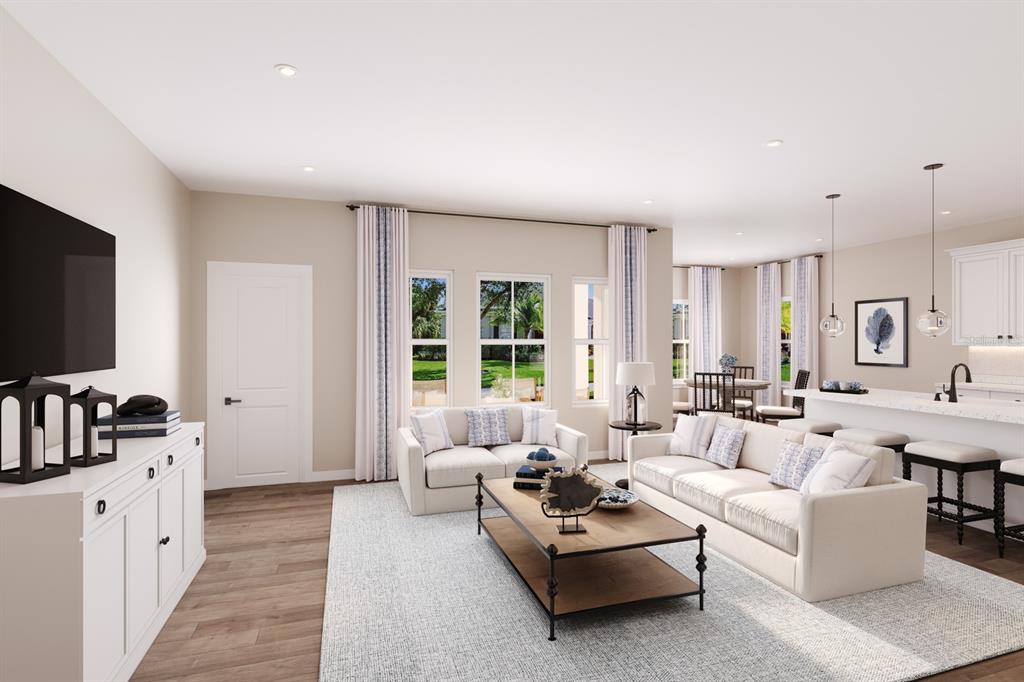 This is a 3D rendering of an open-concept living room and kitchen with neutral decor — 2134 BLUE HERON CIRCLE, AUBURNDALE, FL