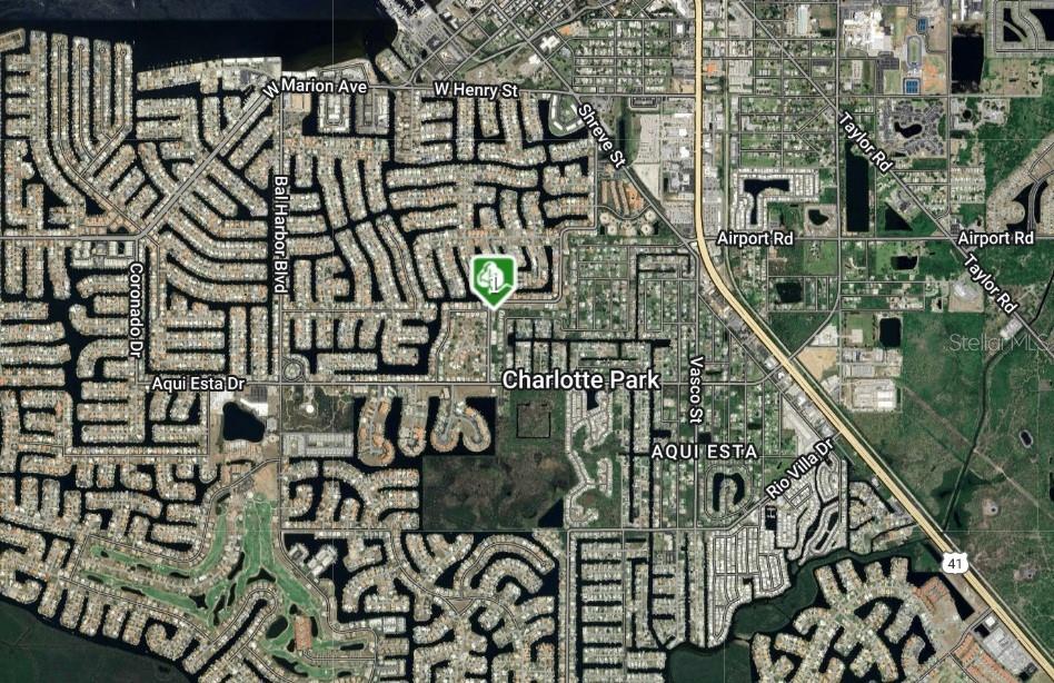 This is an aerial map showing a residential neighborhood in Charlotte Park with canal access — 2900 MAGDALINA DRIVE, PUNTA GORDA, FL