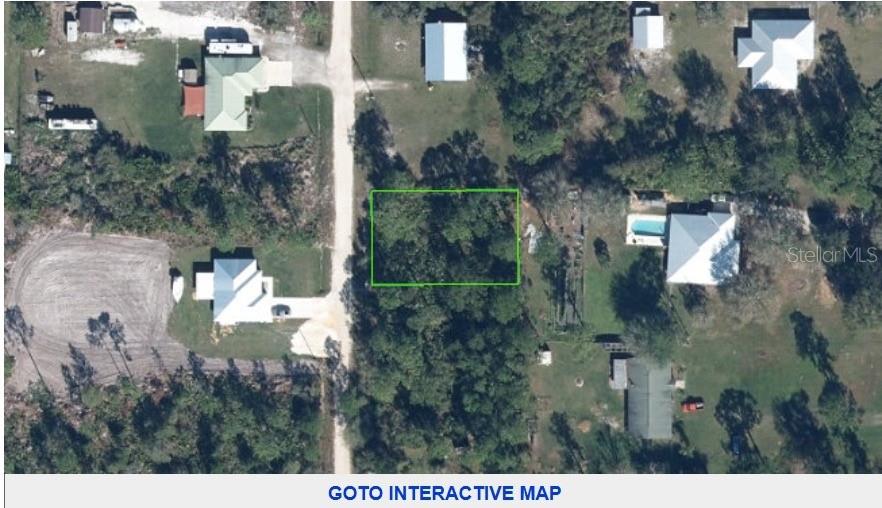 An aerial view shows a rectangular vacant lot outlined in green within a residential area — 6006 HAZEL ROAD, SEBRING, FL