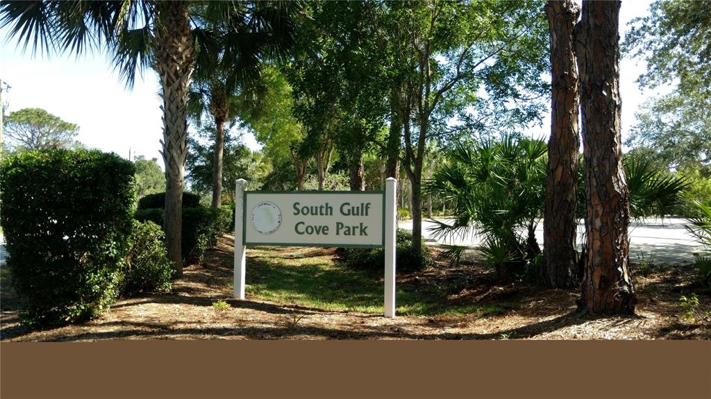 A sign for South Gulf Cove Park stands among trees and landscaping in a park setting — 14473 EDNA CIRCLE, PORT CHARLOTTE, FL