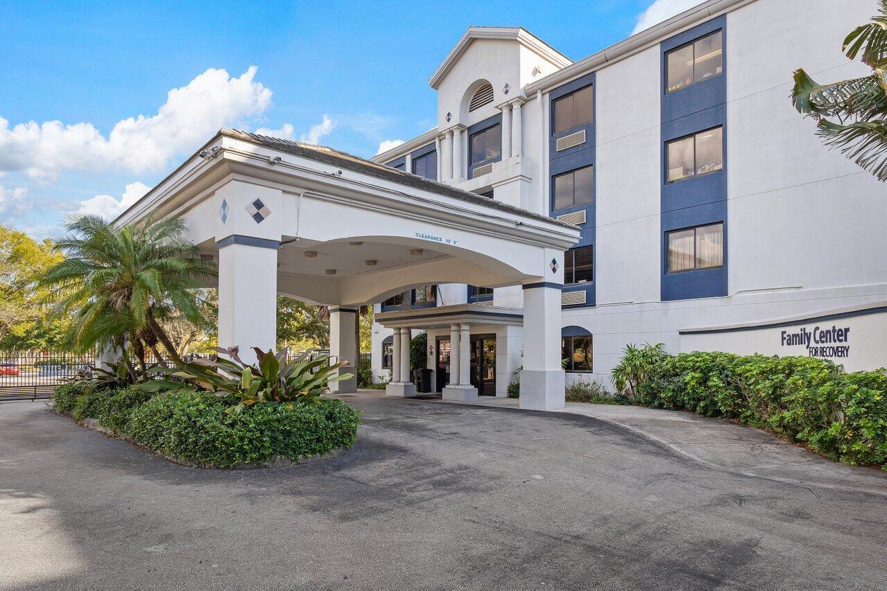A multi-story building with a covered entrance and a sign reading Family Center for Recovery — 7051 Seacrest Boulevard, Lake Worth FL 33462, LAKE WORTH, FL