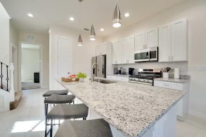 7523 SUNFLOWER CIRCLE, KISSIMMEE, FL — photo 4 of 30