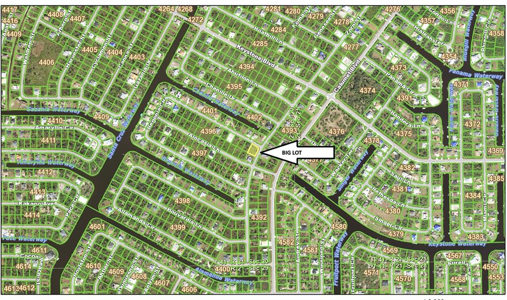 This is a map showing residential lots and waterways in a suburban neighborhood — 13575 BEGONIA CIRCLE, PORT CHARLOTTE, FL