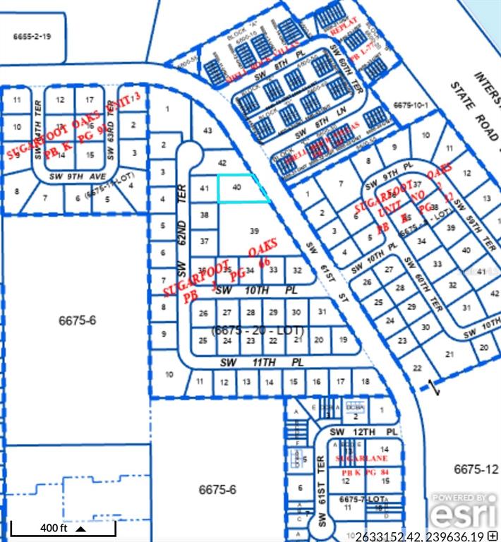 This is a land parcel map showing residential lots, streets, and block numbers — 910 SW 61ST STREET, GAINESVILLE, FL