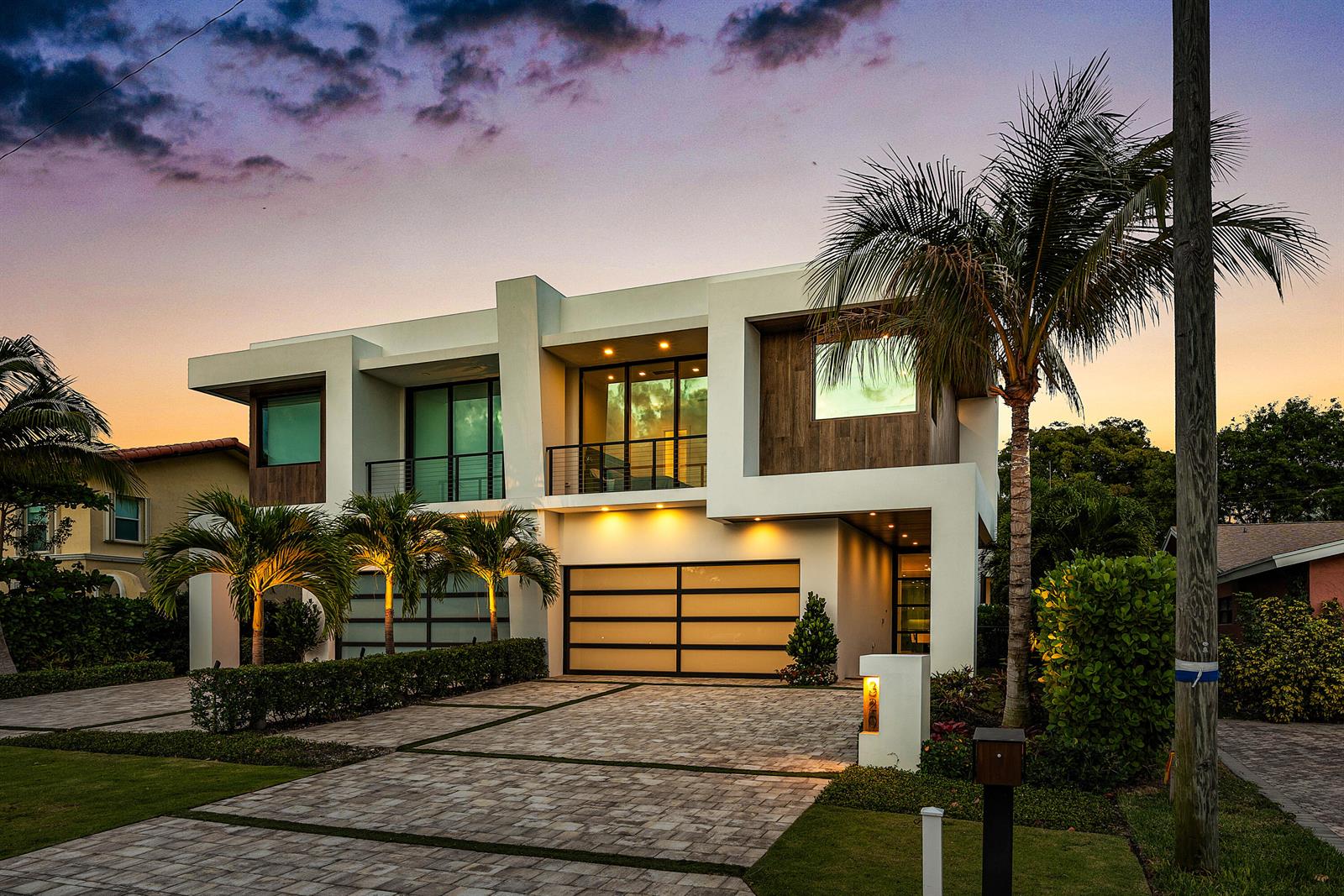 A modern two-story house with a paved driveway, palm trees, and a multi-car garage — 320 NE Wavecrest Way, Boca Raton FL 33432, BOCA RATON, FL