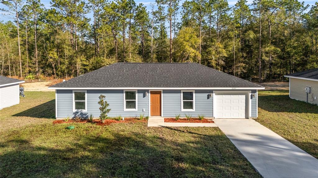 This is a floor plan for a single-story house with three bedrooms and a garage — TBD SW 30TH STREET, OCALA, FL