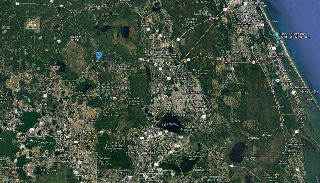 This is a satellite map showing the region between Lake George and the Atlantic coast — 27654 COUNTY ROAD 42, PAISLEY, FL