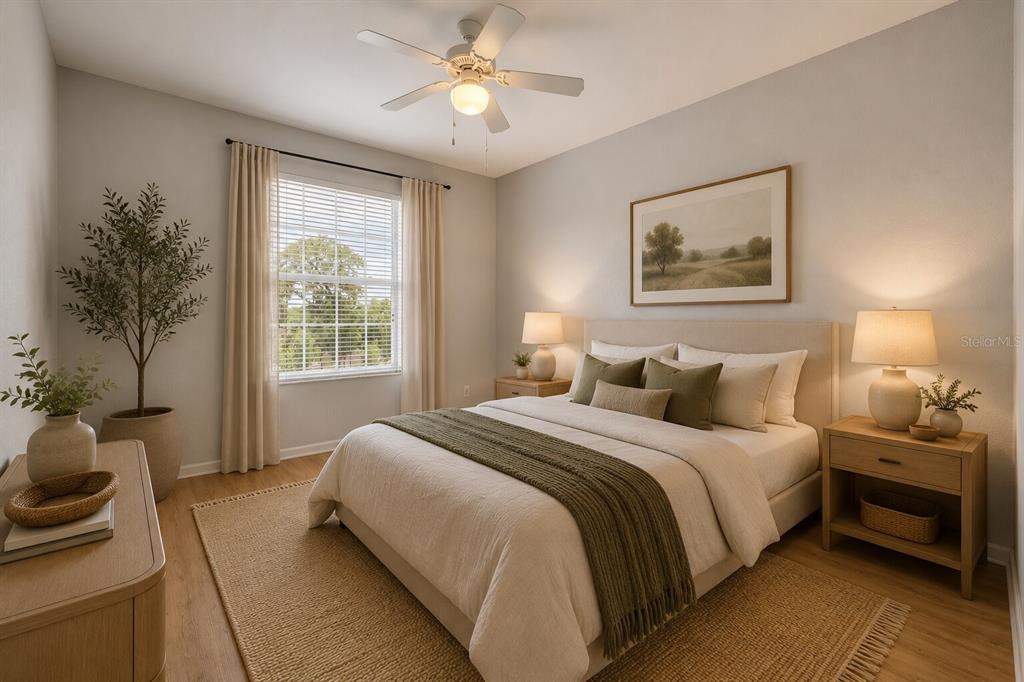 A bedroom features a queen bed, two nightstands, a ceiling fan, and a large window — 582 BRANTLEY TERRACE WAY UNIT 304, ALTAMONTE SPRINGS, FL