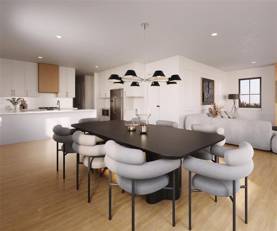 This rendering shows a modern open-concept dining area with a dark table and light chairs — 650 MEDORA WAY, WINTER GARDEN, FL