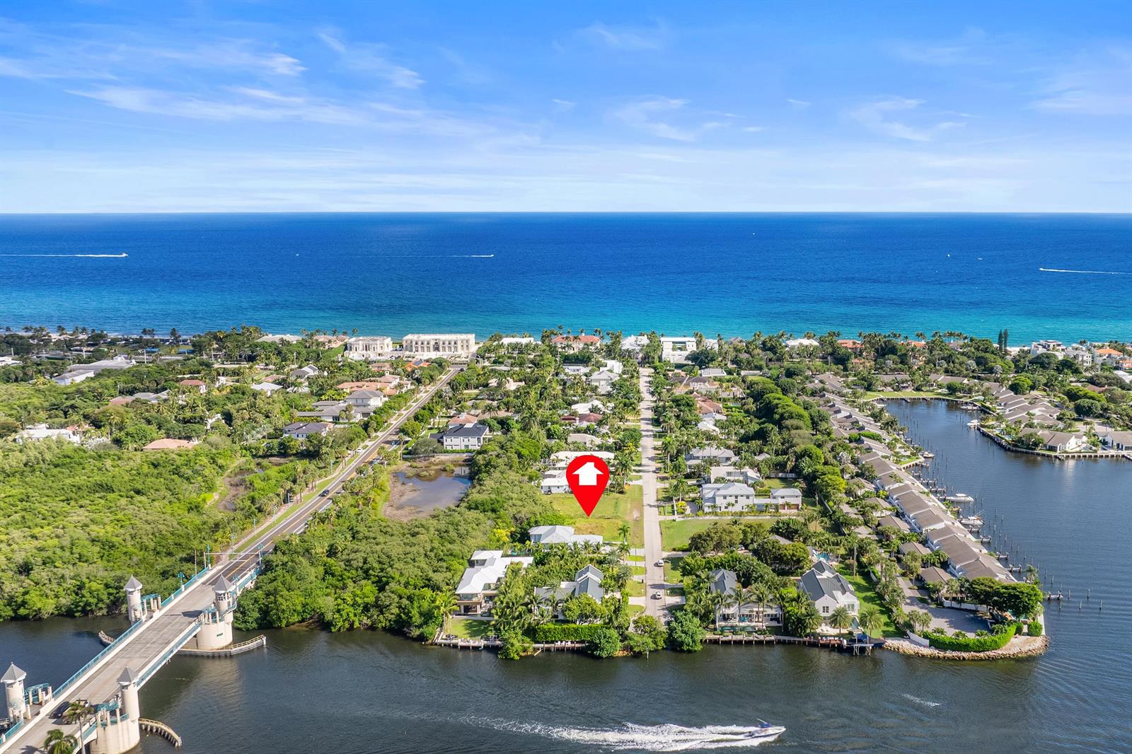 An aerial view shows a vacant residential lot marked with a red pin near water — 22 Hudson Avenue, Ocean Ridge FL 33435, OCEAN RIDGE, FL
