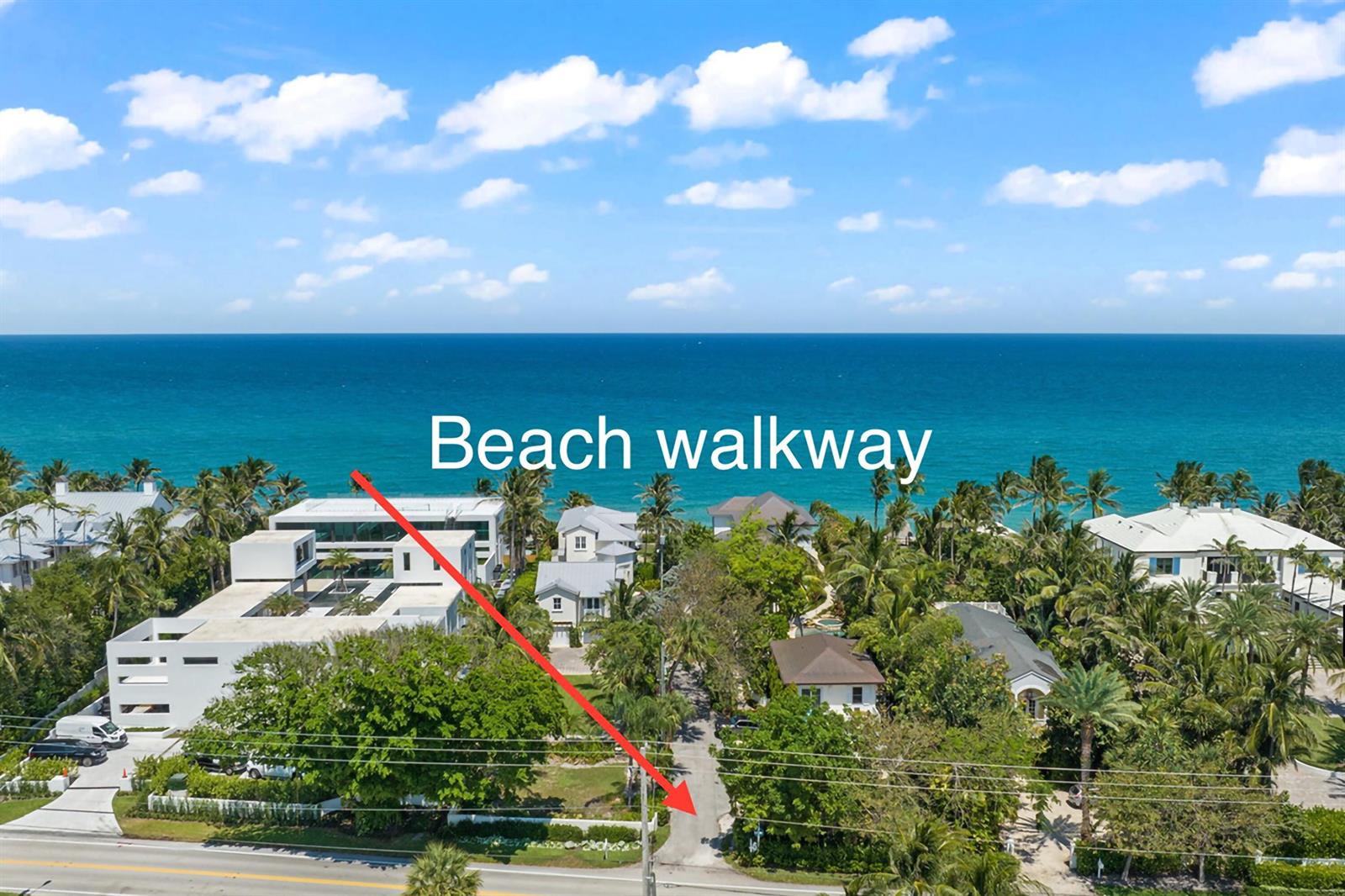 An aerial view shows a beach access path leading from a road toward the ocean — 22 Hudson Avenue, Ocean Ridge FL 33435, OCEAN RIDGE, FL
