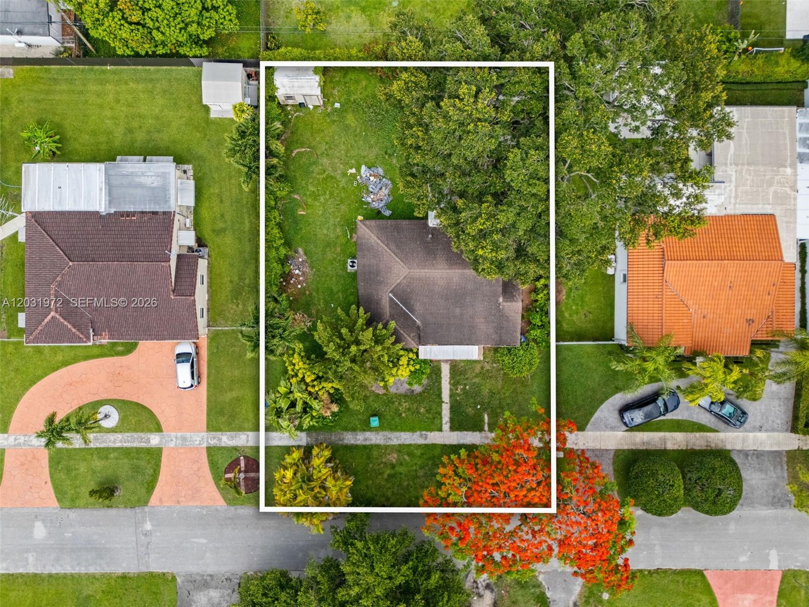 An aerial view shows a residential lot with a house, large trees, and a backyard — 3900 SW 59th Ave, Miami FL 33155, MIAMI, FL