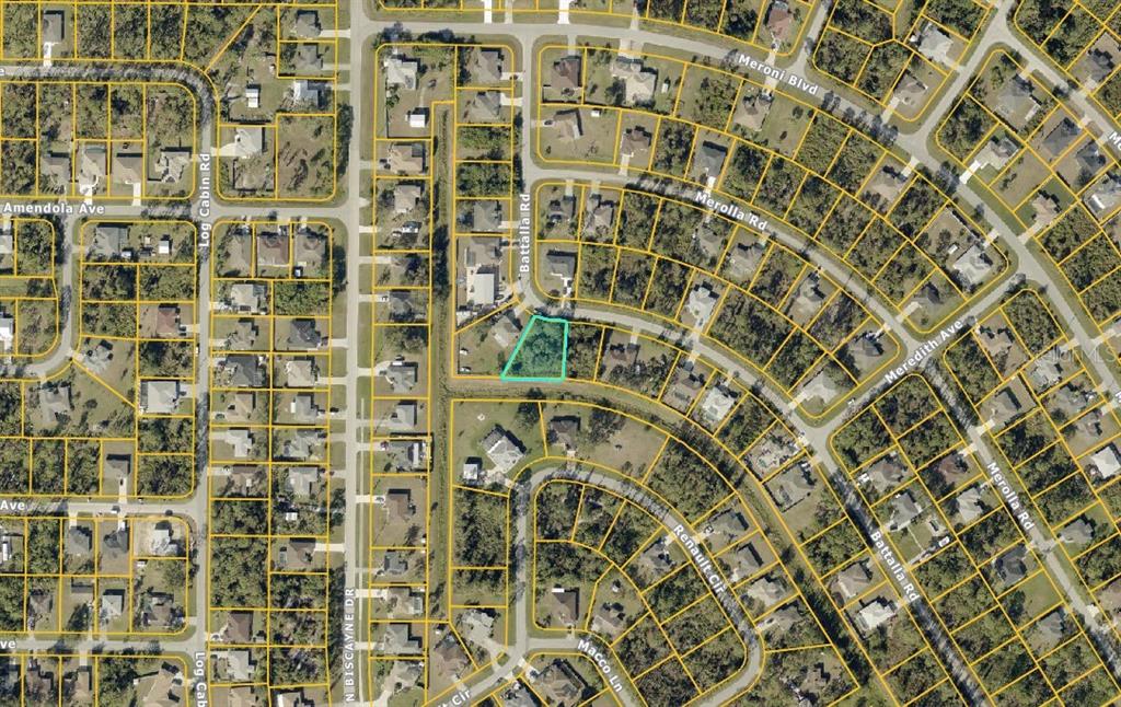 This is an aerial map view of a vacant residential lot outlined in light blue — Lot #9 BATTALLA ROAD, NORTH PORT, FL