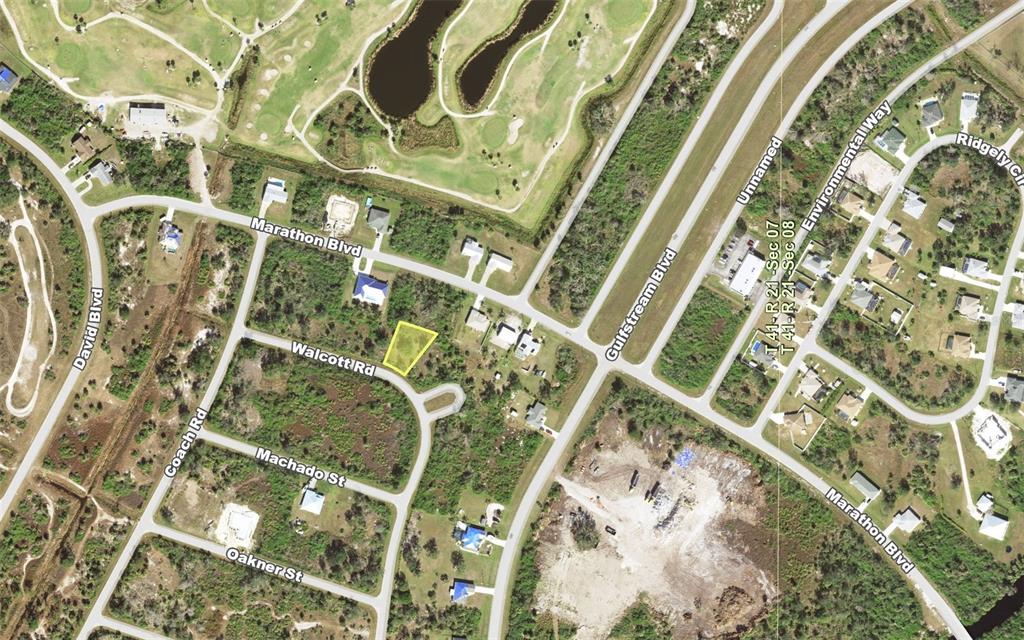 An aerial map view shows a highlighted vacant residential lot situated at a street corner — 7232 WALCOTT ROAD, PORT CHARLOTTE, FL