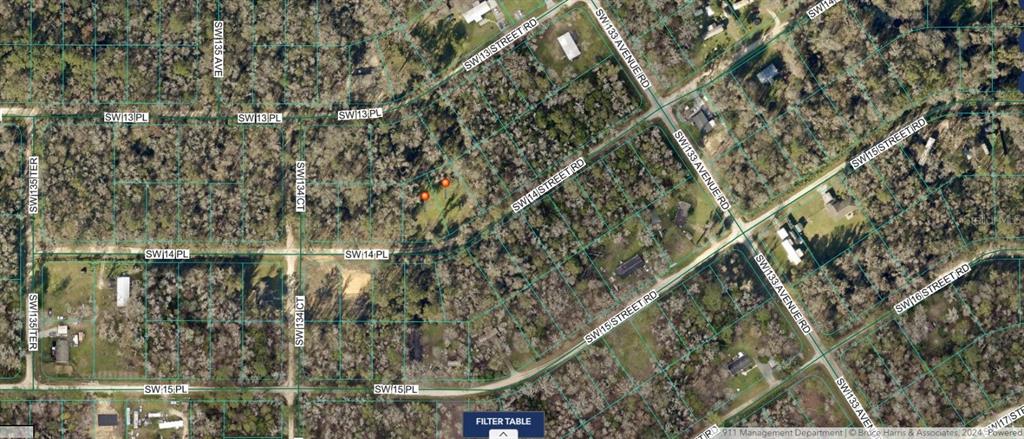 This is an aerial map showing wooded residential lots and street layouts in a neighborhood — 00 SW 14TH AVENUE, OCALA, FL
