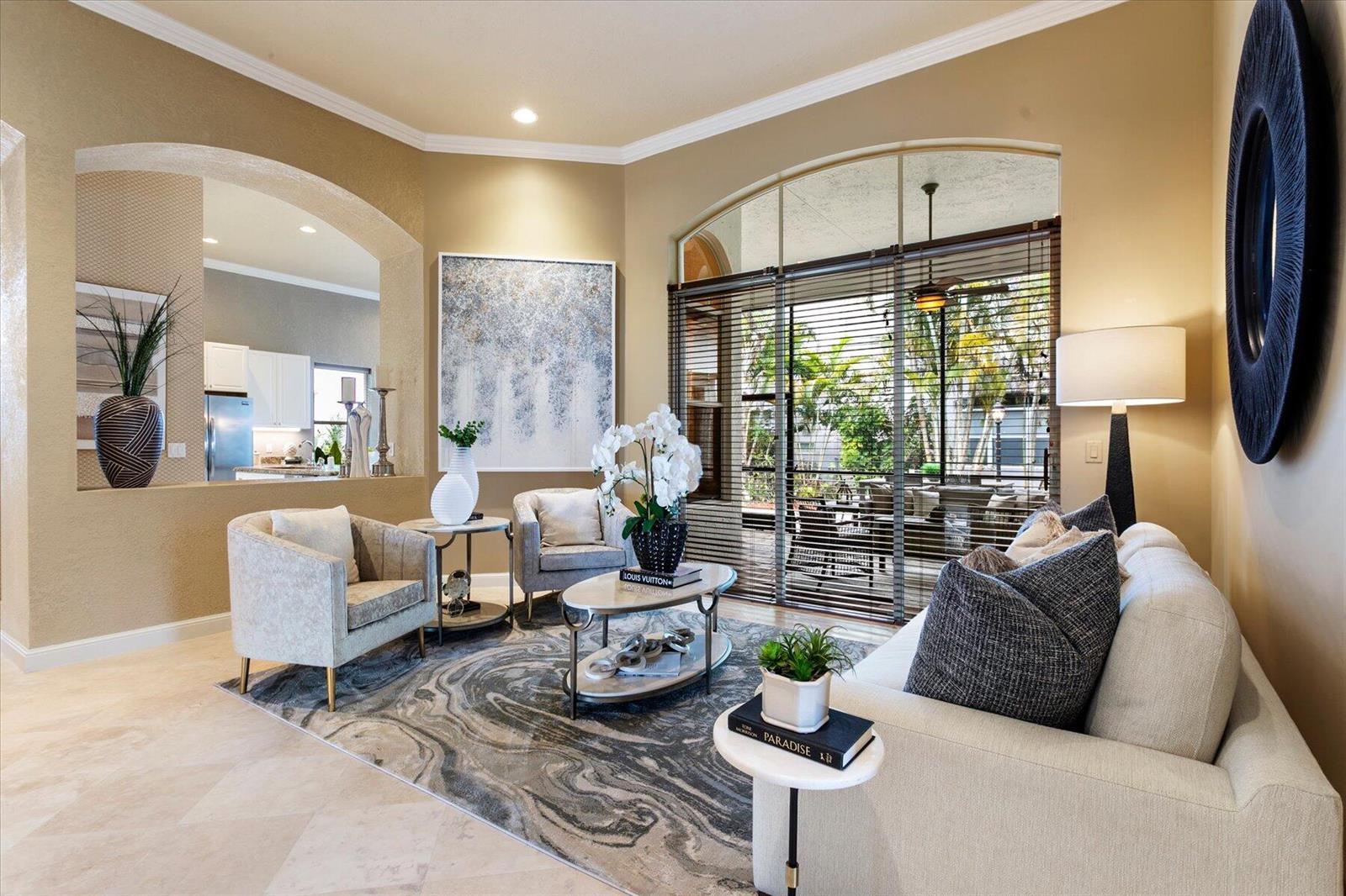 A living room features a beige sofa, two armchairs, a marble coffee table, and sliding doors — 6059 Bither Way, Lake Worth FL 33467, LAKE WORTH, FL