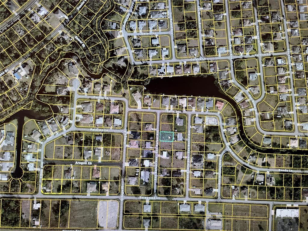 This is an aerial map showing a residential neighborhood with a highlighted vacant lot — LOT 16 SAN RAFAEL AVENUE, NORTH PORT, FL