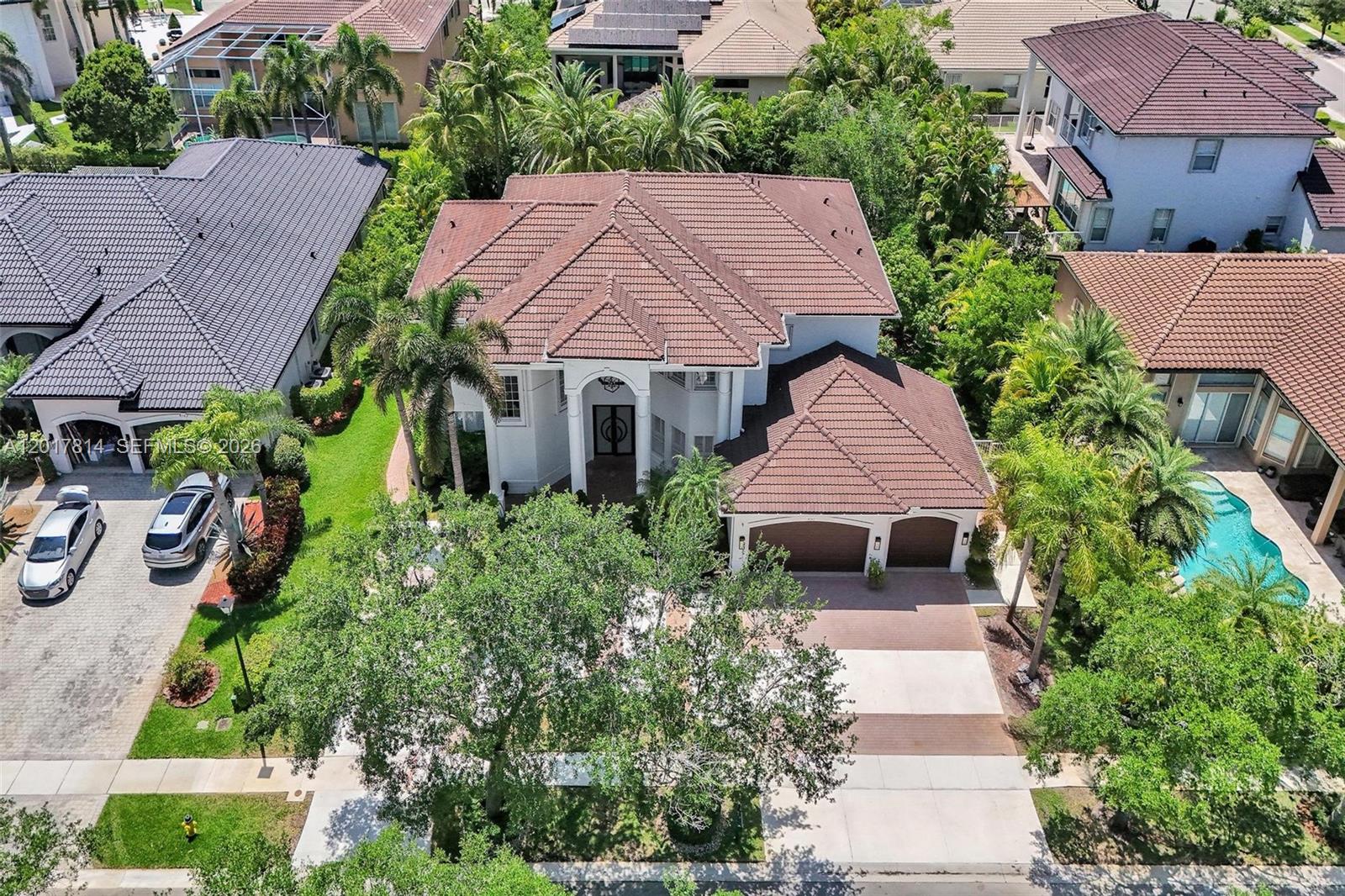 An aerial view shows a two-story house with a brown tile roof and garage — 4142 SW 188th Ave, Miramar FL 33029, MIRAMAR, FL