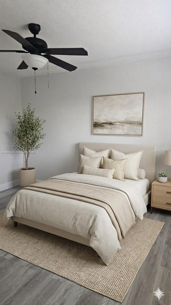 This bedroom features a neutral color palette, a platform bed, and a ceiling fan — 3800 SW 102nd Ave # 221, Miami FL 33165, MIAMI, FL