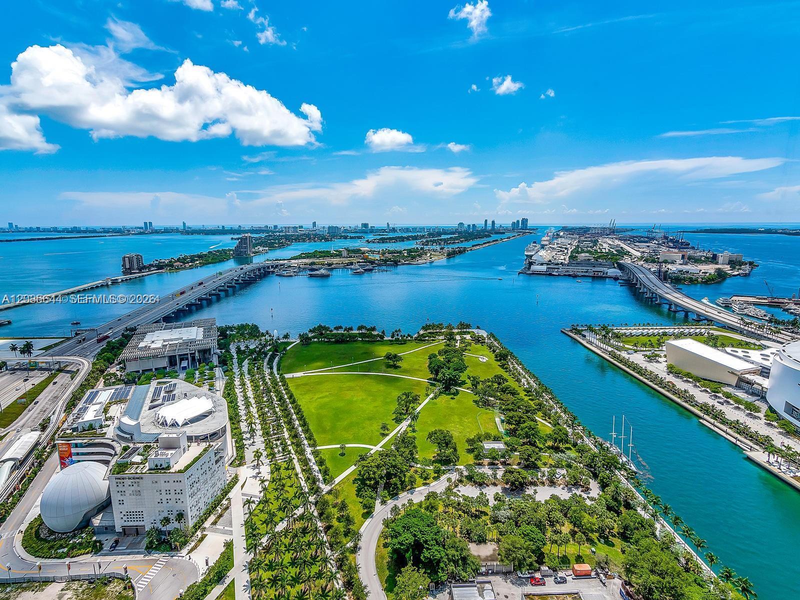 An aerial view of Museum Park in Miami featuring the Frost Science Museum and surrounding waterways — 1000 Biscayne Blvd # 4802, Miami FL 33132, MIAMI, FL