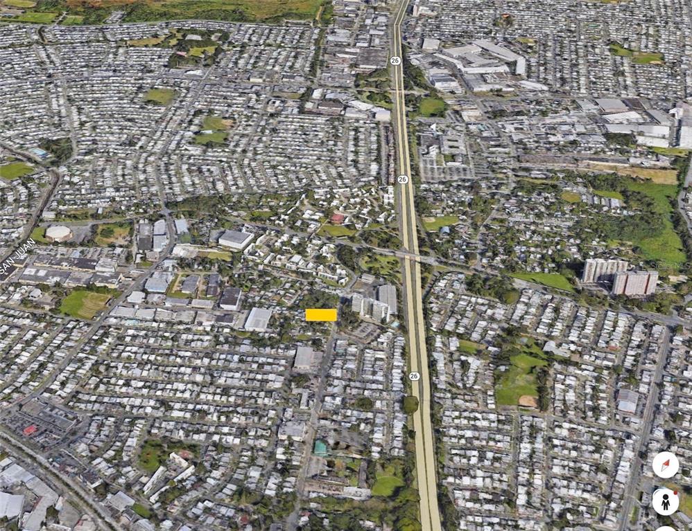 This is an aerial map view showing a highlighted property lot near a highway — CALLE ANDINO, CAROLINA, PR