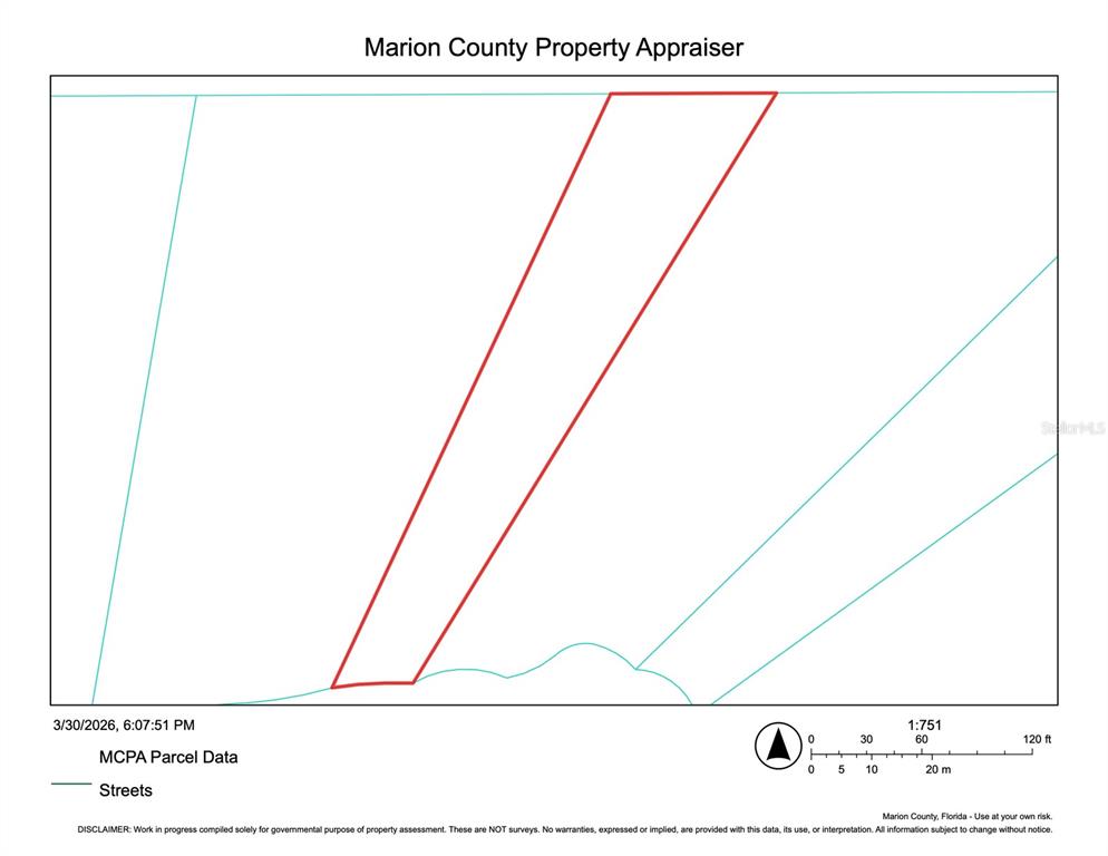 This is a parcel map showing a property boundary highlighted in red — TBD SW SHOREWOOD DRIVE, DUNNELLON, FL