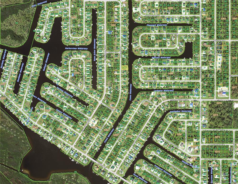 This is an aerial map showing a residential neighborhood with houses, streets, and waterways — 4234 LIBRARY STREET, PORT CHARLOTTE, FL