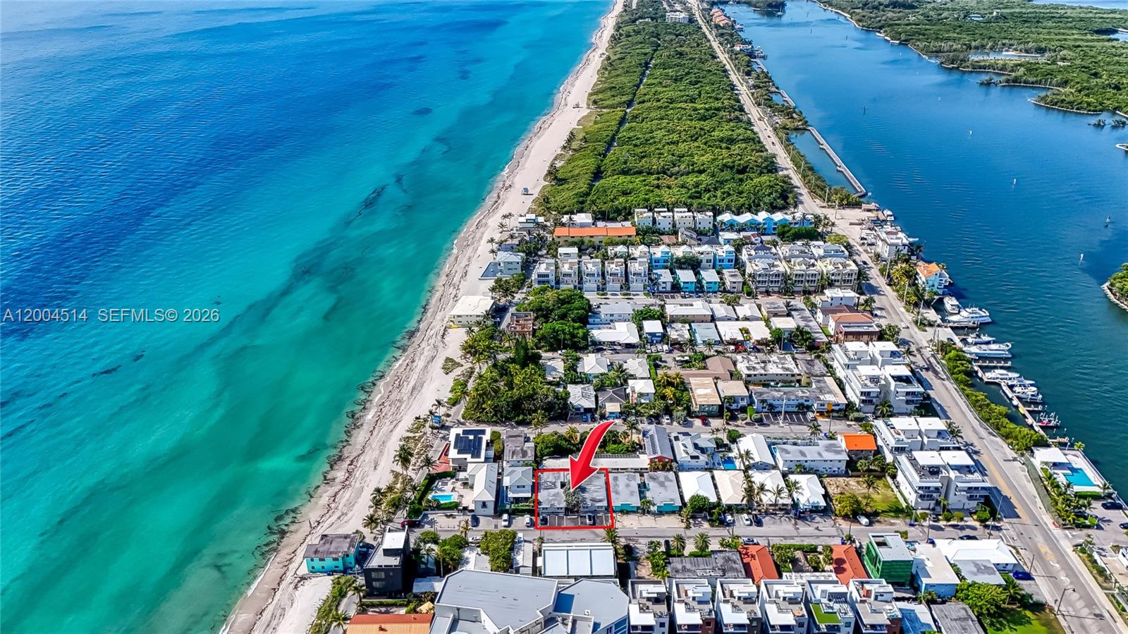 An aerial view shows a coastal neighborhood with a red-outlined building near the beach — 318 Walnut St, Hollywood FL 33019, HOLLYWOOD, FL