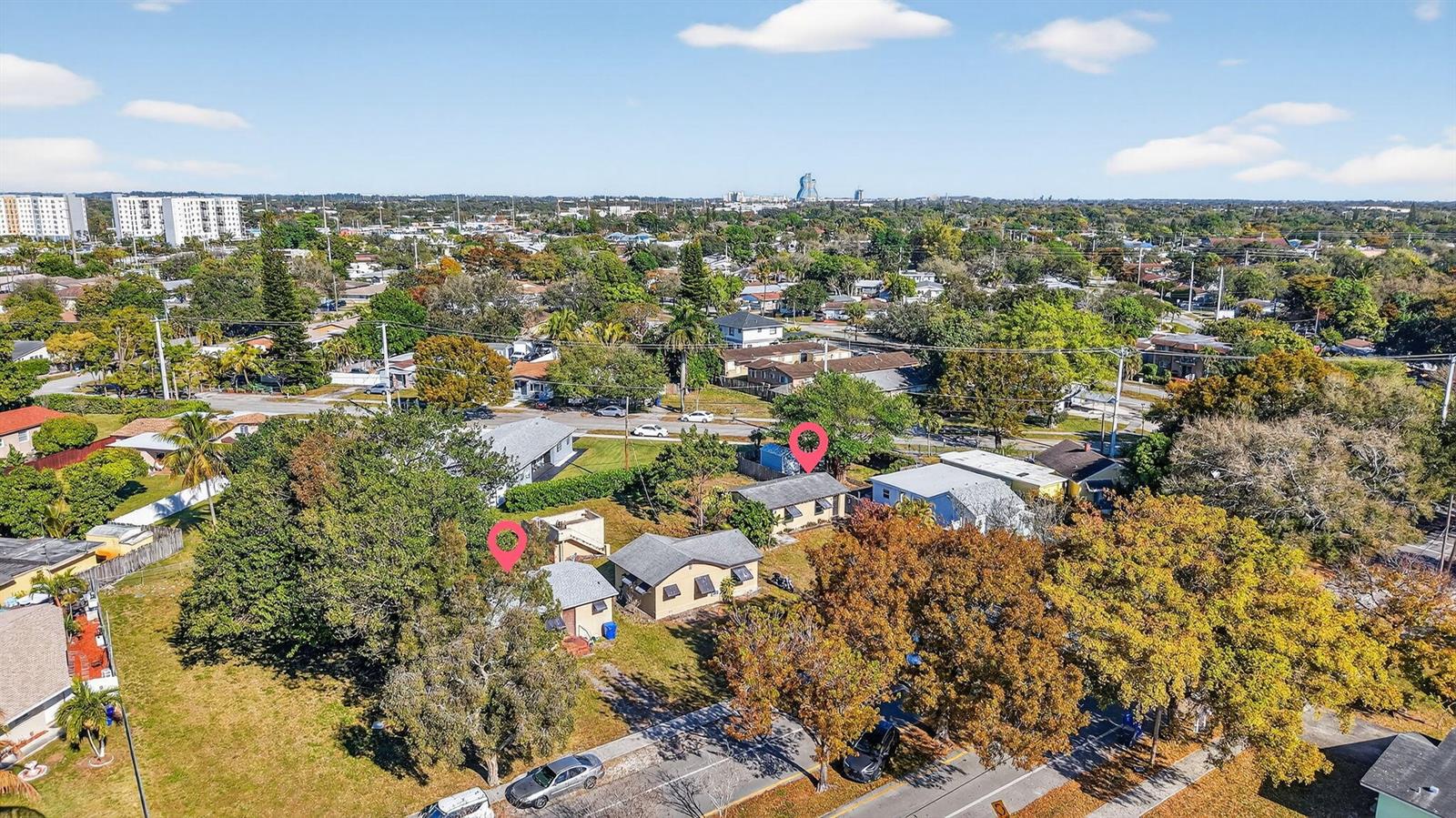 An aerial view shows two adjacent residential houses with red location markers on a lot — 411 Columbus Parkway # 5, Hollywood FL 33021, HOLLYWOOD, FL