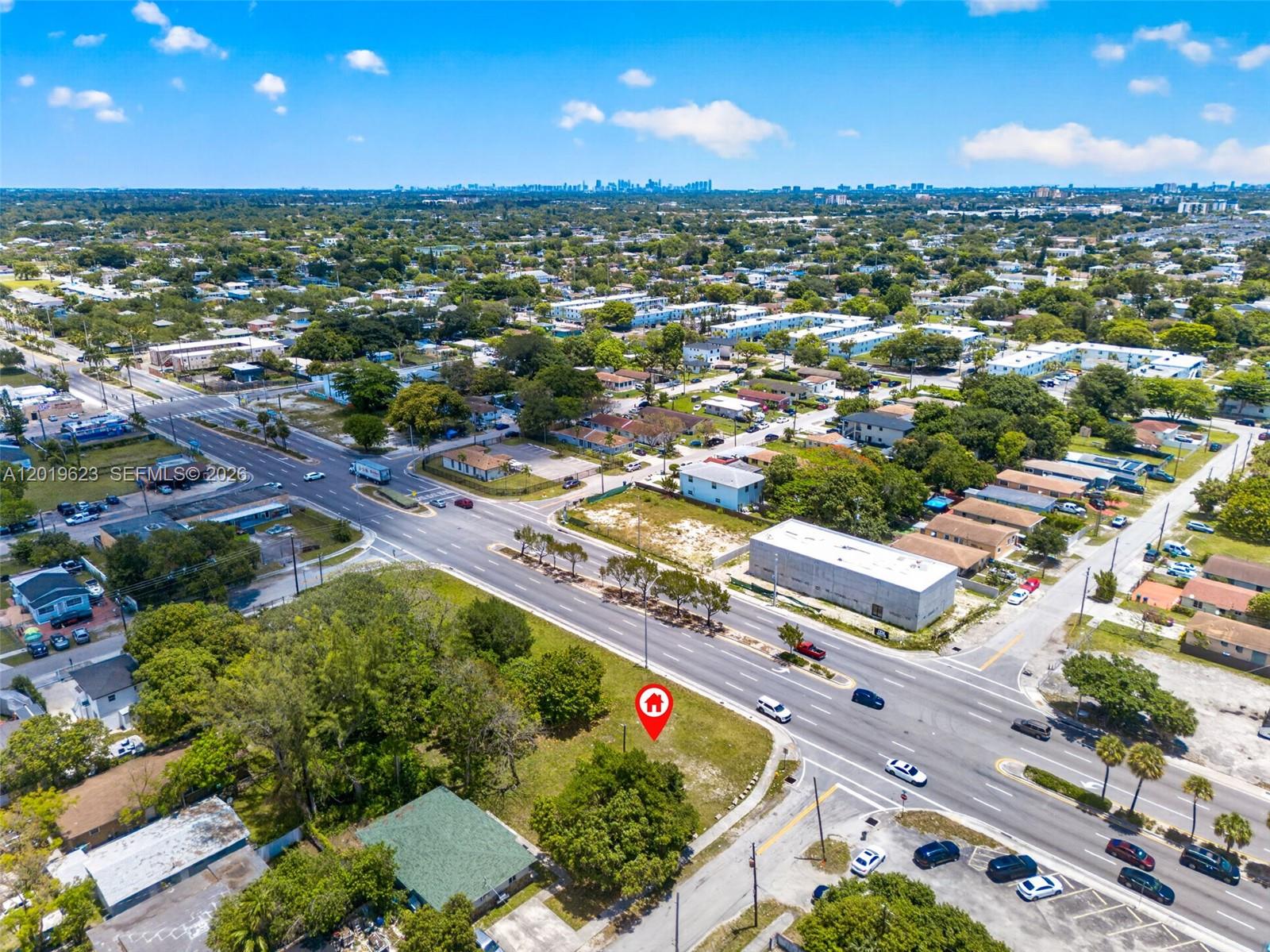 An aerial view shows a vacant lot marked with a pin near a busy intersection — 63rd Miami FL 33147-0000, Miami FL 33147, MIAMI, FL