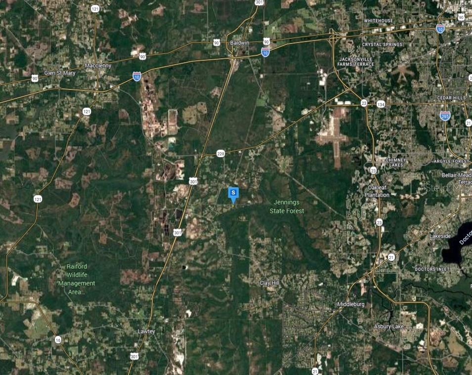 This is a satellite map showing Jennings State Forest and surrounding areas near Jacksonville, Florida — 819 GREGORY ROAD, JACKSONVILLE, FL