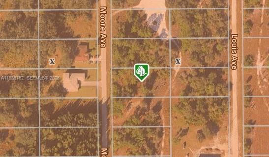 This is an aerial map showing residential lots between Moore Avenue and Louis Avenue — 1812 MOORE AVE, Lehigh Acres FL 33972, LEHIGH ACRES, FL