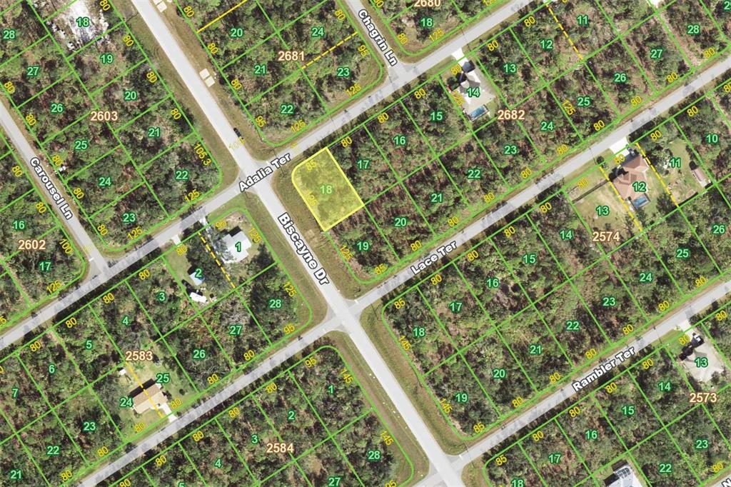 This is a map showing a vacant residential lot highlighted in yellow at a street intersection — 1340 ADALIA TERRACE, PORT CHARLOTTE, FL