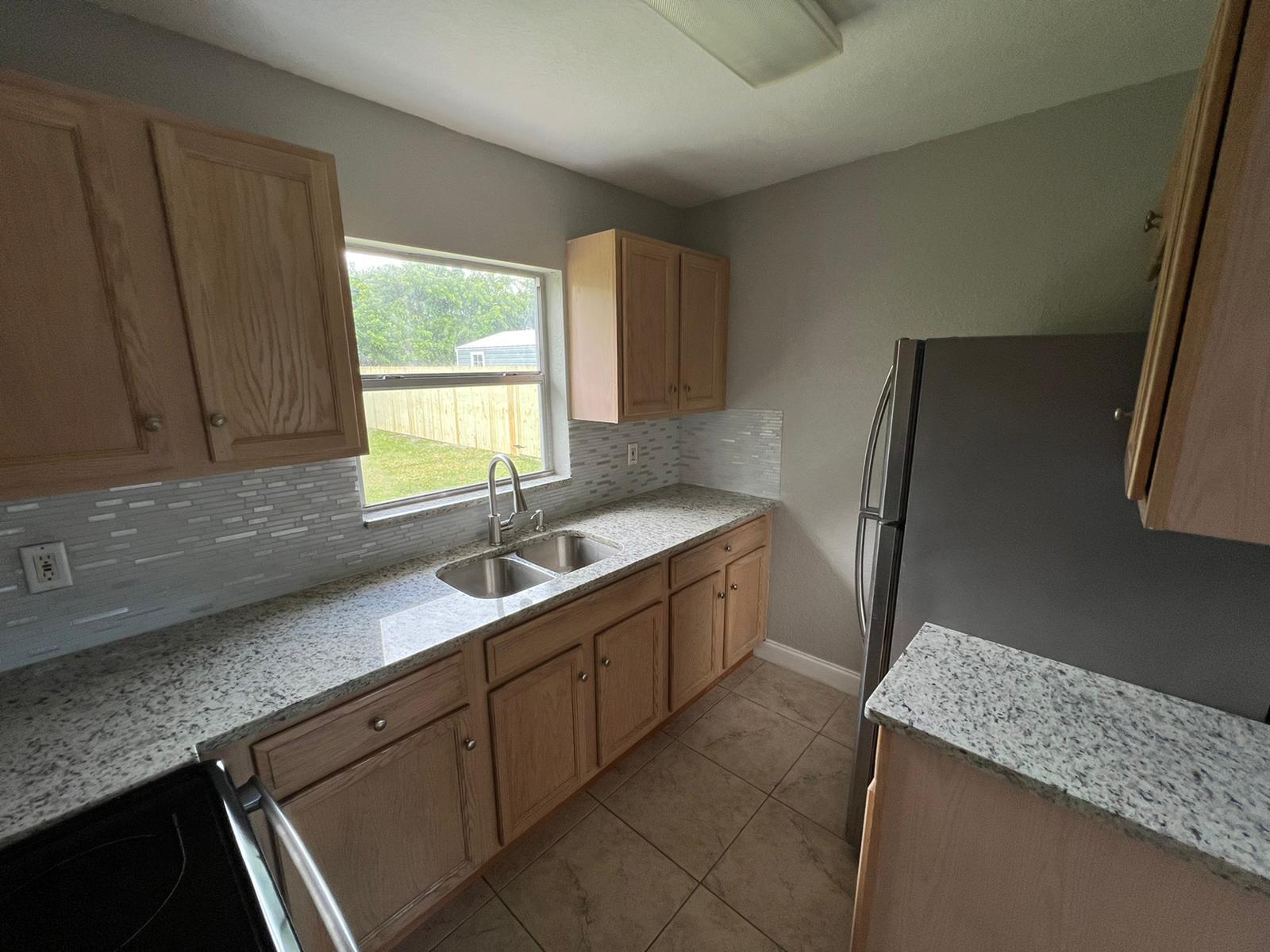 1883 Breezy Lane, West Palm Beach FL 33417