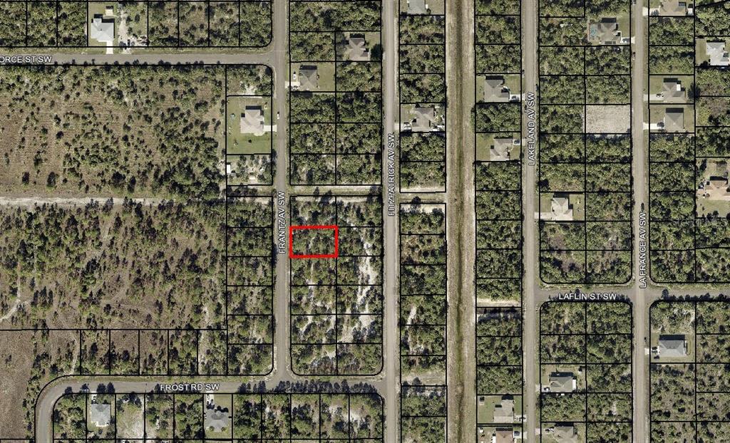 This is an aerial map showing a vacant lot outlined in red within a residential area — 3165 FRANTZ AVENUE SW, PALM BAY, FL